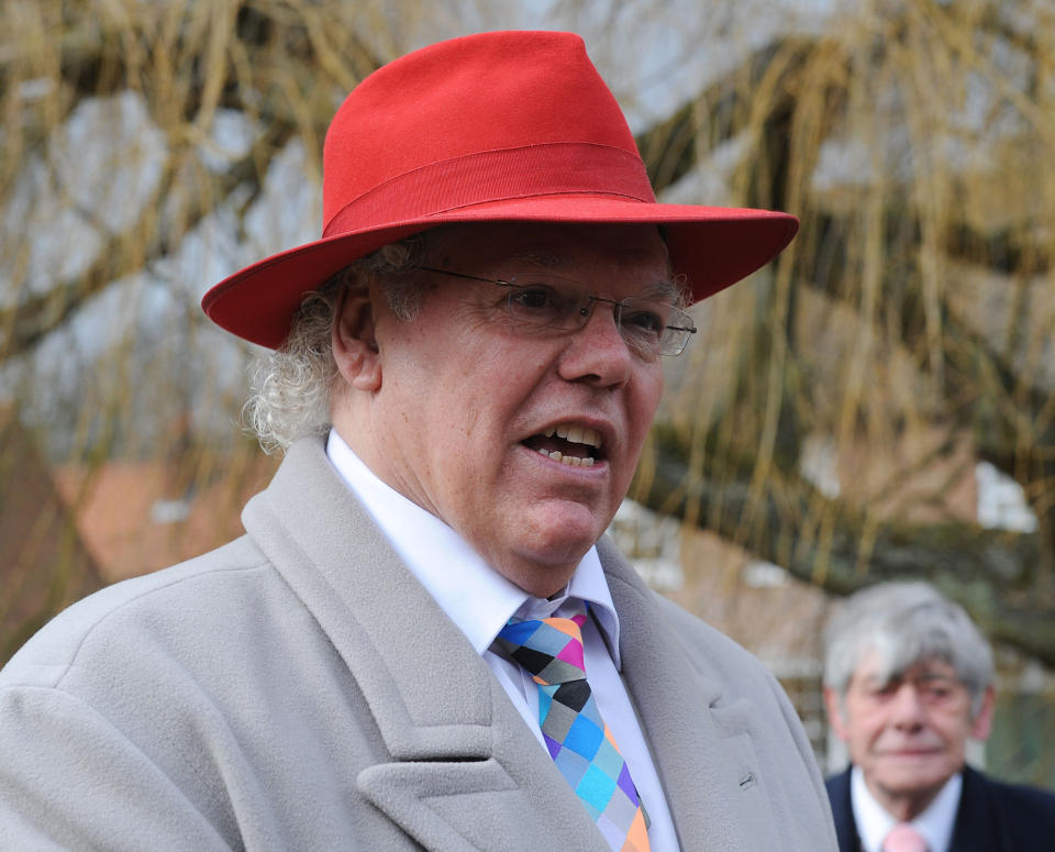 Comedian Roy 'Chubby' Brown arrives for the funeral of Norman Collier.