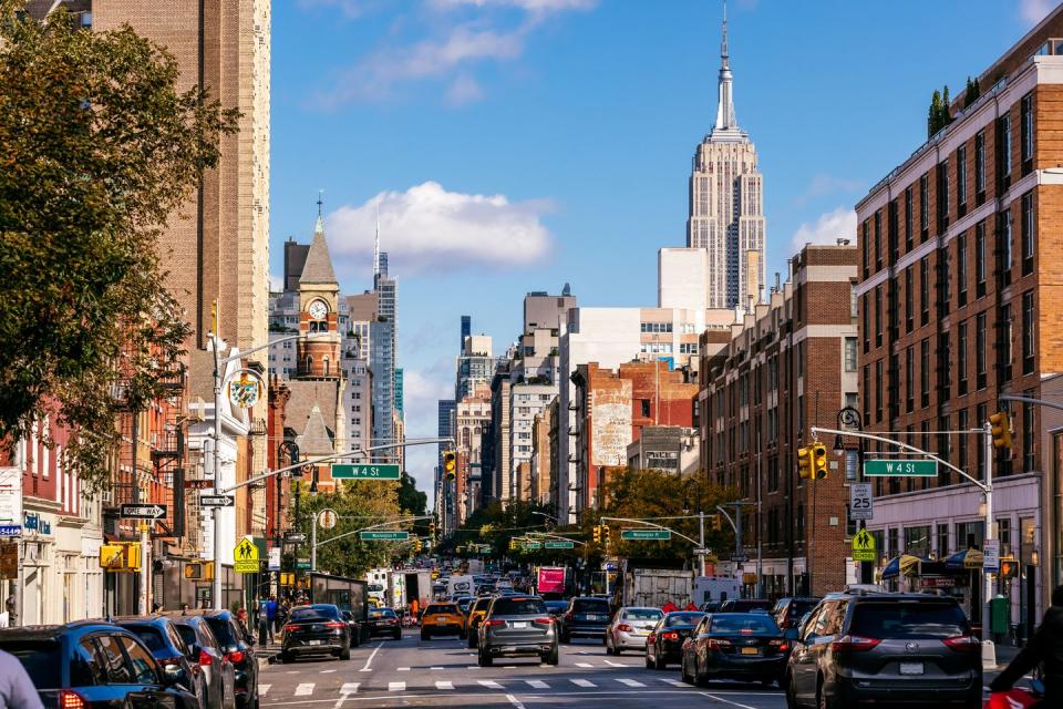 sixth avenue going through west village in new york city, usa