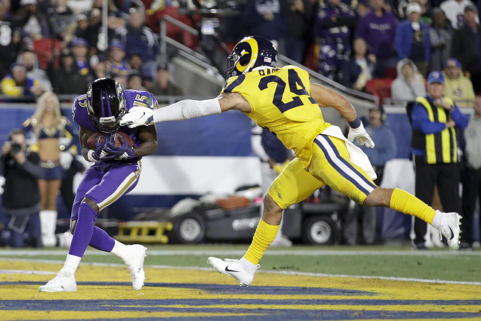 Baltimore Ravens wide receiver Marquise Brown scores past Los Angeles Rams safety Taylor Rapp during the first half of an NFL football game Monday, Nov. 25, 2019, in Los Angeles. (AP Photo/Marcio Jose Sanchez)