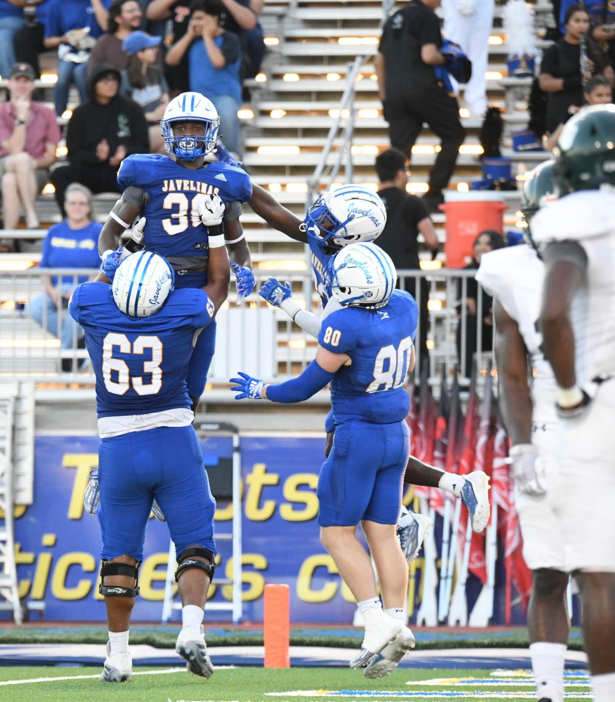 Texas A&M-Kingsville running back Toneil Carter celebrates with Juan Quezada after scoring a touchdown against Eastern New Mexico at Javelina Stadium in Kingsville, Texas on Saturday, Sept. 24, 2022.