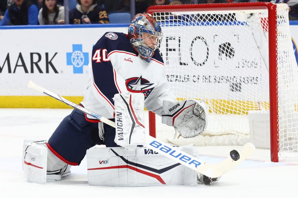 Columbus Blue Jackets goalie Daniil Tarasov (40) makes a stick-save during the first period of an NHL hockey game against the Buffalo Sabres, Saturday, Dec. 30, 2023, in Buffalo, N.Y. (AP Photo/Jeffrey T. Barnes)
(Credit: Jeffrey T. Barnes, AP)