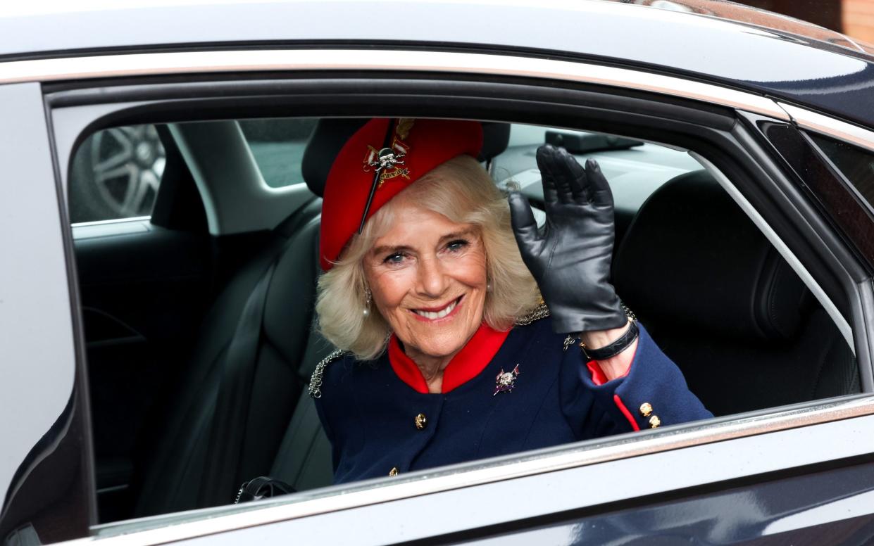 Camilla was received by a royal salute before braving the rain to inspect some of the 152 men on parade