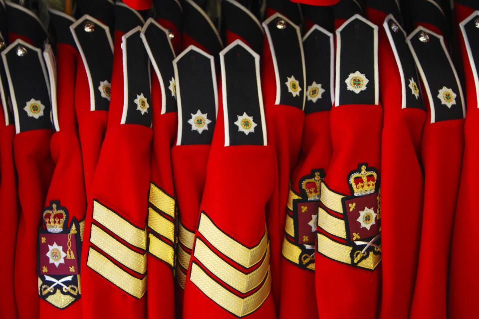 Home Service tunics of the Irish Guards on a rack at their barracks in Windsor, as they prepare for their ceremonial duties during the wedding of Prince William and Kate Middleton next week.