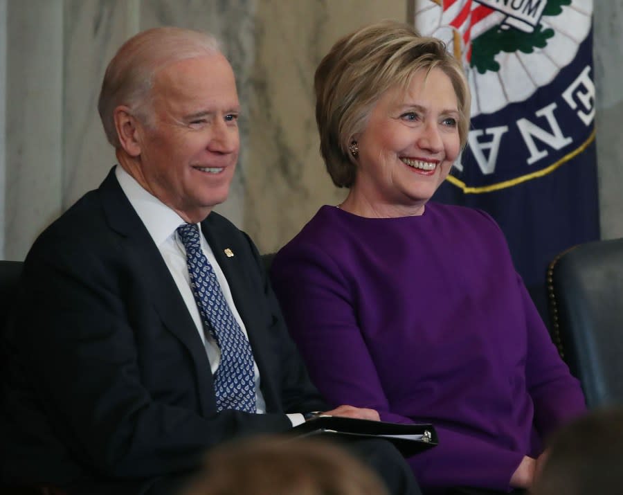 WASHINGTON, DC – DECEMBER 08: Former US Secretary of State, Hillary Clinton shares a laugh with US Vice President Joseph Biden, during a portrait unveiling ceremony for outgoing Senate Minority Leader Harry Reid (D-NV), on Capitol Hill December 8, 2016 in Washington, DC. (Photo by Mark Wilson/Getty Images)