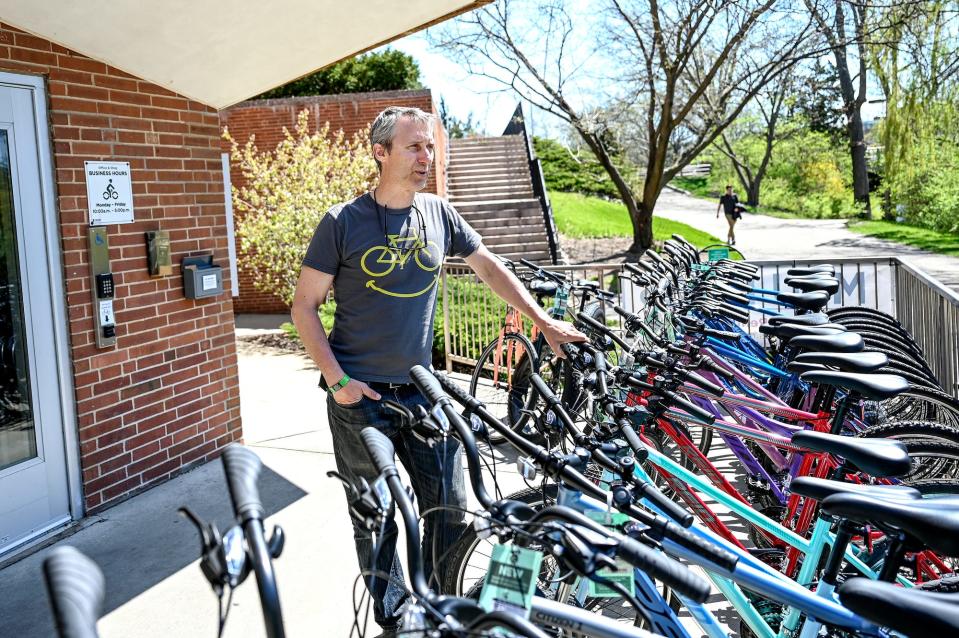 Tim Potter, manager of the MSU Bikes Service Center, talks about the Greater Lansing 2022 Ride of Silence on Monday, May 9, 2022, outride the shop in East Lansing. Potter is one of the organizers for the Greater Lansing 2022 Ride of Silence.