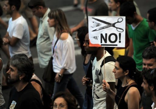 An anti-cuts demonstration in Barcelona last week. Spanish long-term borrowing costs jumped to record highs on Monday as investors turned increasingly sceptical about government efforts to stabilise a stricken banking system and the public finances