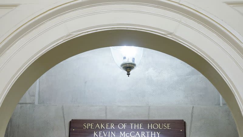 A sign still bearing the name of Rep. Kevin McCarthy, R-Calif., is seen outside the office of the House speaker on Capitol Hill on Monday, Oct. 23, 2023, in Washington.