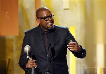 Actor Forest Whitaker accepts the outstanding actor in a motion picture award for "The Butler" during the 45th NAACP Image Awards in Pasadena, California February 22, 2014. REUTERS/Danny Moloshok