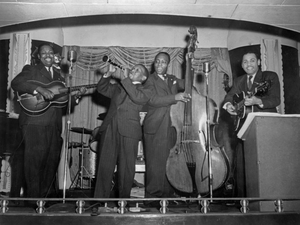 An unidentified band plays jazz onstage at an unidentified venue in Chicago, circa 1920s.