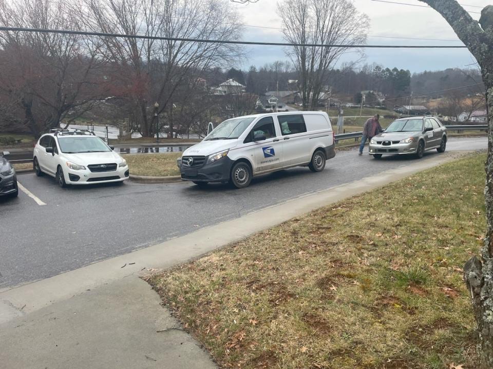 A U.S. Postal Service van gears up for another delivery at the Mars Hill post office.