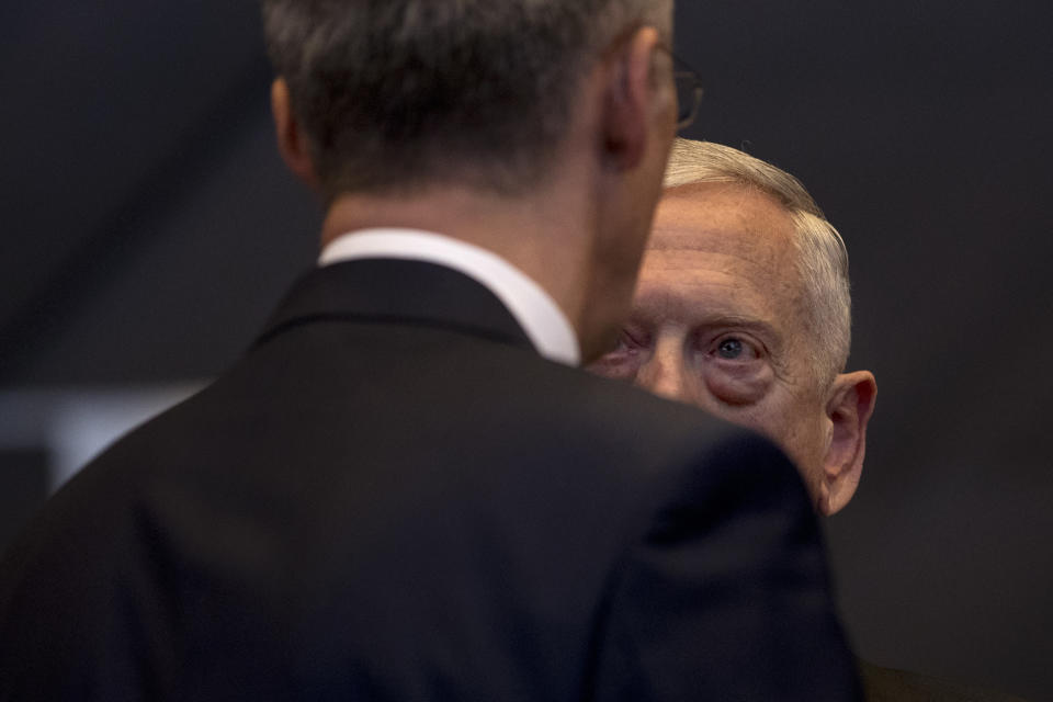 U.S. Secretary for Defence Jim Mattis, right, talks to NATO's Secretary General Jens Stoltenberg during the second day of a meeting of the North Atlantic Council at a gathering of NATO defence ministers at NATO headquarters in Brussels, Thursday, Oct. 4, 2018. (AP Photo/Francisco Seco)