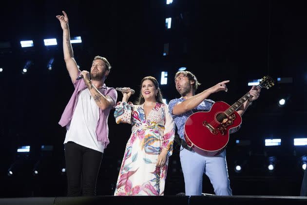 Charles Kelley, from left, Hillary Scott, and Dave Haywood of Lady A perform during CMA Fest 2022 in Nashville, Tenn., on June 12. (Photo: Photo by Amy Harris/Invision/AP, File)