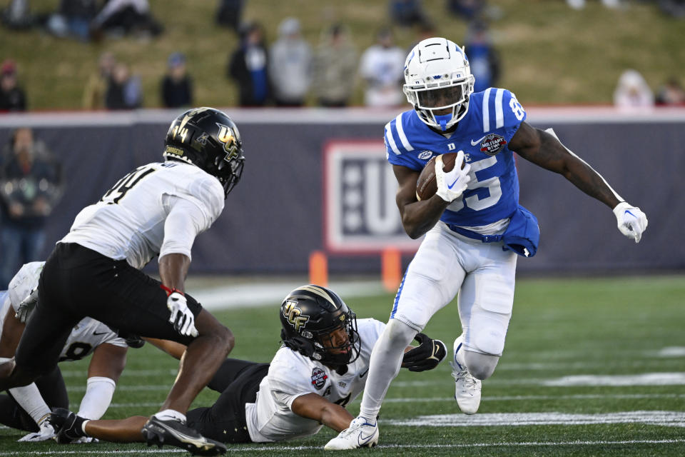 Duke wide receiver Sahmir Hagans runs with the ball after making a catch during the second half of the Military Bowl NCAA college football game against UCF, Wednesday, Dec. 28, 2022, in Annapolis, Md. (AP Photo/Terrance Williams)