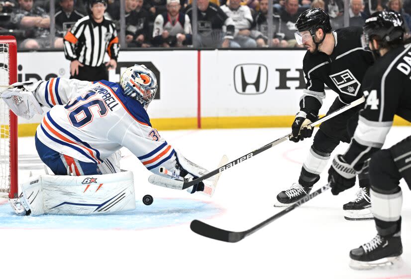 Los Angeles, California April 23, 2023-Kings Matt Roy, center, scores the go-ahead goal.