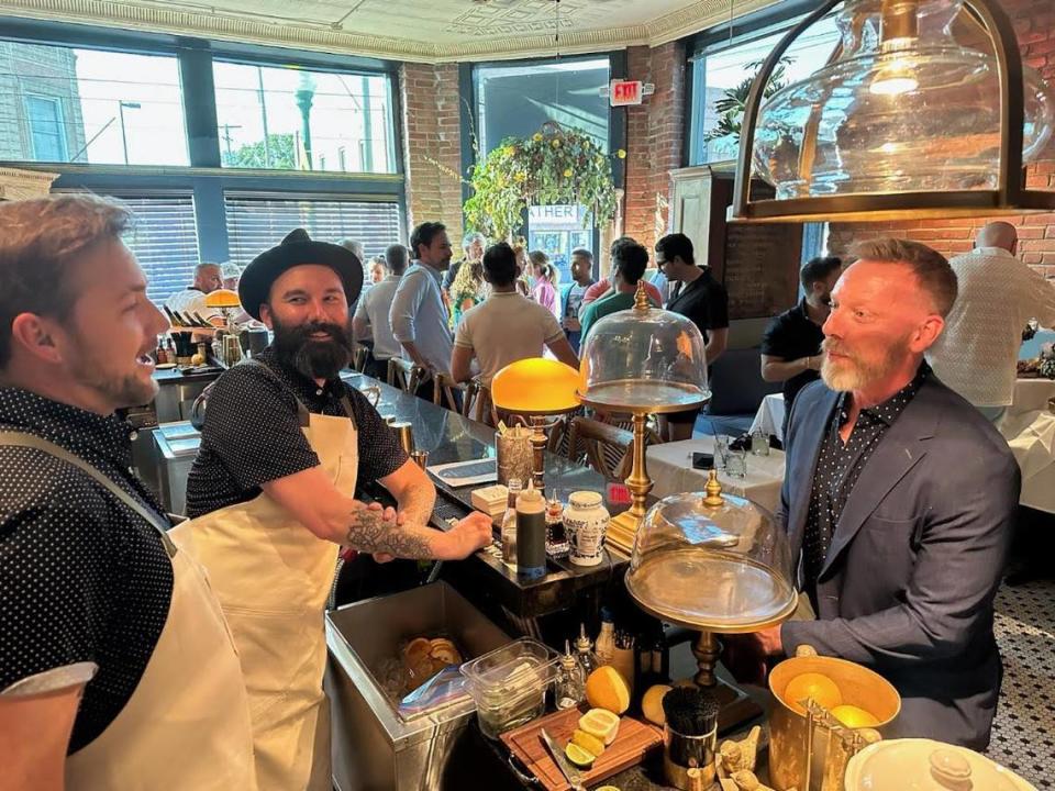 Chad Alexander chats with employees at a preopening event for Bijou.