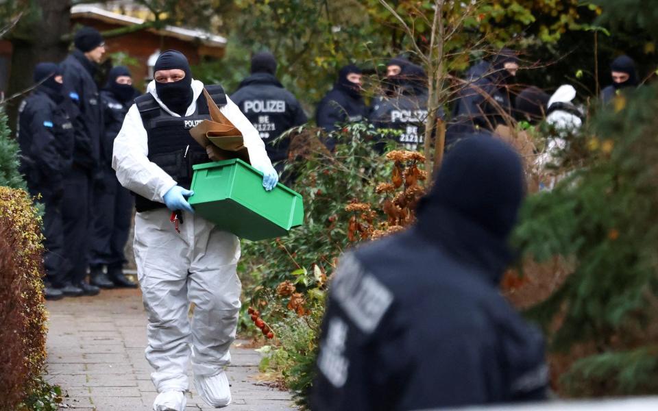 Police during a raid in Berlin in December 2022