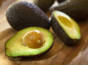 <b>Avocado </b><br>Don't let the fat content of an avocado (29 grams) scare you—that's what makes it a top weight loss food, Kraus says. "The heart-healthy monounsaturated fat it contains increases satiety," she says. And it's terrific summer party food. <br><b>Eat more</b> Add avocado to your sandwich instead of mayo for a creamy texture and a shot of flavor. Avocados do contain a lot of calories, so it's best to watch your portions. One easy way to do it: Try Wholly Guacamole's 100-calorie fresh guacamole packs ($3; grocery stores or WhollyGuac.com). They're easy to pack in your lunch and pair with chopped vegetables.