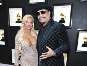 <p>The husband-wife duo matched in harlequin patterned ensembles. Ice-T wore a navy blue velvet Gucci suit jacket and Coco glittered in a form-fitting sequin dress.</p>