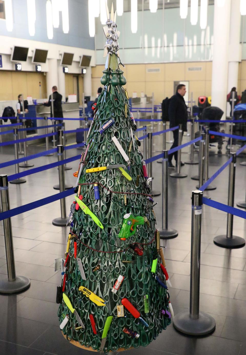 A "Christmas tree" deftly made of confiscated items on display at Vilnius Airport in Vilnius, Lithuania, on December 12, 2019.