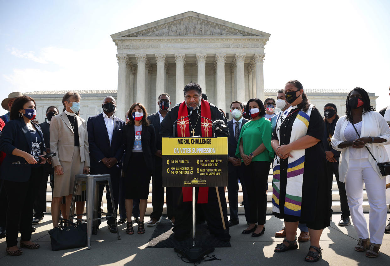 Rev. William Barber, Co-Chair of the Poor People’s Campaign, speaks alongside Texas State Representatives and fellow religious leaders, as they prepare to deliver a petition to Senate Majority Leader Charles Schumer calling for an end to the filibuster, the passage of the For The People Act and restoring the Voting Rights Act, at the U.S. Supreme Court in Washington, on Aug. 12, 2021.