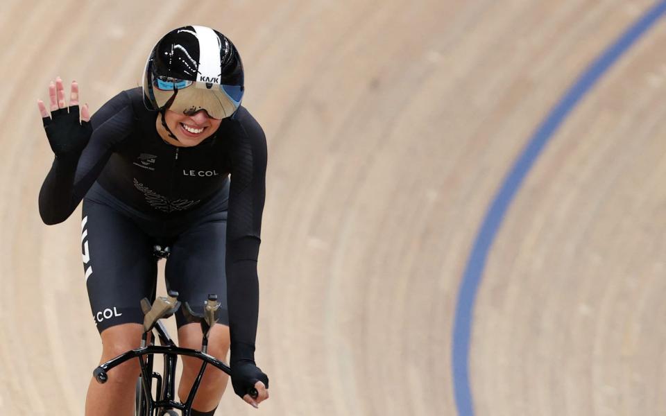 New Zealand's Bryony Botha reacts to beating the Commonwealth Games record after competing in the women's 3000m individual pursuit qualifying round on day two of the Commonwealth Games - AFP