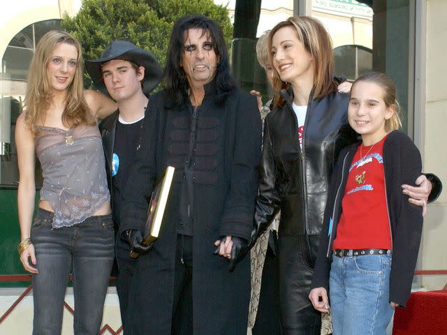 Patrick Rideaux/Shutterstock Alice Cooper and his family celebrating his star at the Hollywood Walk of Fame