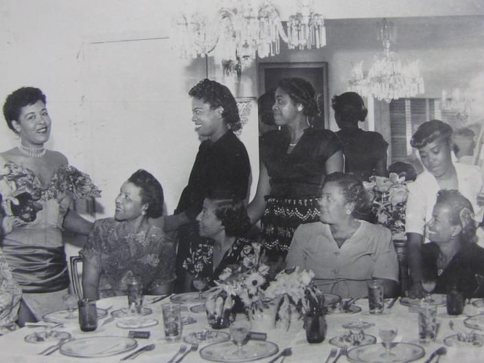 Entertainers such as Billie Holiday, far left, frequented Georgette&#x002019;s Tea Room at 2540 NW 51st Street in Brownsville in the 1950s and 1960s. In this file photo from the Black Archives in Miami, Holiday entertains a group of Miami area schoolteachers.