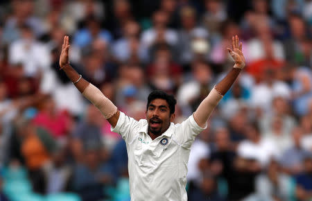 FILE PHOTO: Cricket - England v India - Fifth Test - Kia Oval, London, Britain - September 8, 2018 India's Jasprit Bumrah celebrates the wicket of England's Adil Rashid Action Images via Reuters/Paul Childs