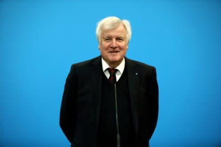 FILE PHOTO: Leader of the Christian Social Union (CSU) Horst Seehofer during a statement before the start of coalition talks at the Christian Democratic Union (CDU) party headquarters in Berlin, Germany, January 26, 2018. REUTERS/Christian Mang/File Photo