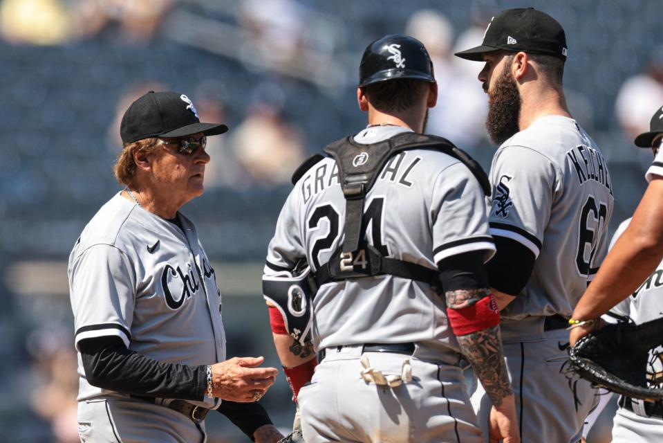 White Sox manager Tony La Russa takes the ball from starting pitcher Dallas Keuchel.