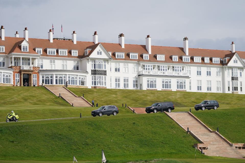 The convoy for Trump leaves his South Ayrshire golf course (PA)