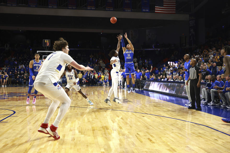 Memphis guard Jahvon Quinerly (11) hits the game-winning shot against Tulsa in an NCAA college basketball game, Thursday, Jan. 4, 2024, in Tulsa, Okla. (AP Photo/Joey Johnson)