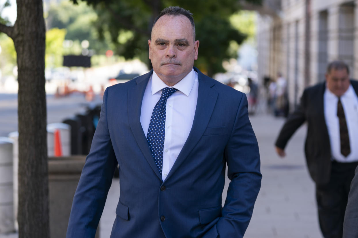 Retired New York Police Department officer Thomas Webster leaves the federal courthouse in Washington, Thursday, Sept. 1, 2022. Webster was sentenced on Thursday to 10 years in prison for attacking the U.S. Capitol and using a metal flagpole to assault one of the police officers trying to hold off a mob of Donald Trump supporters. (AP Photo/Jose Luis Magana)