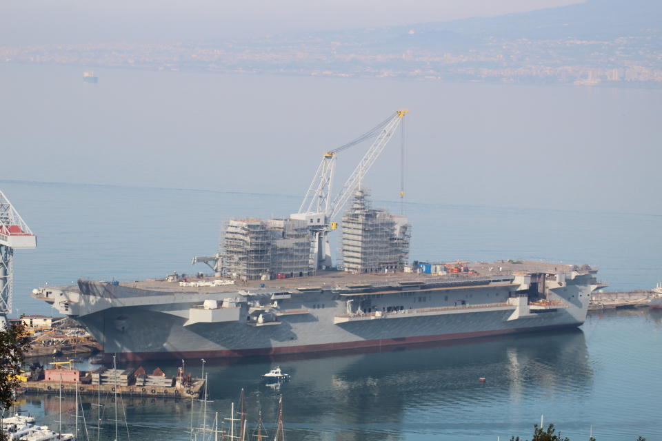 The Italian Navy’s <em>Trieste</em> LPH moored at the fitting-out quay of Fincantieri’s Castellammare di Stabia shipyard in 2020. <em>Ivan Guida/Wikimedia Commons</em>