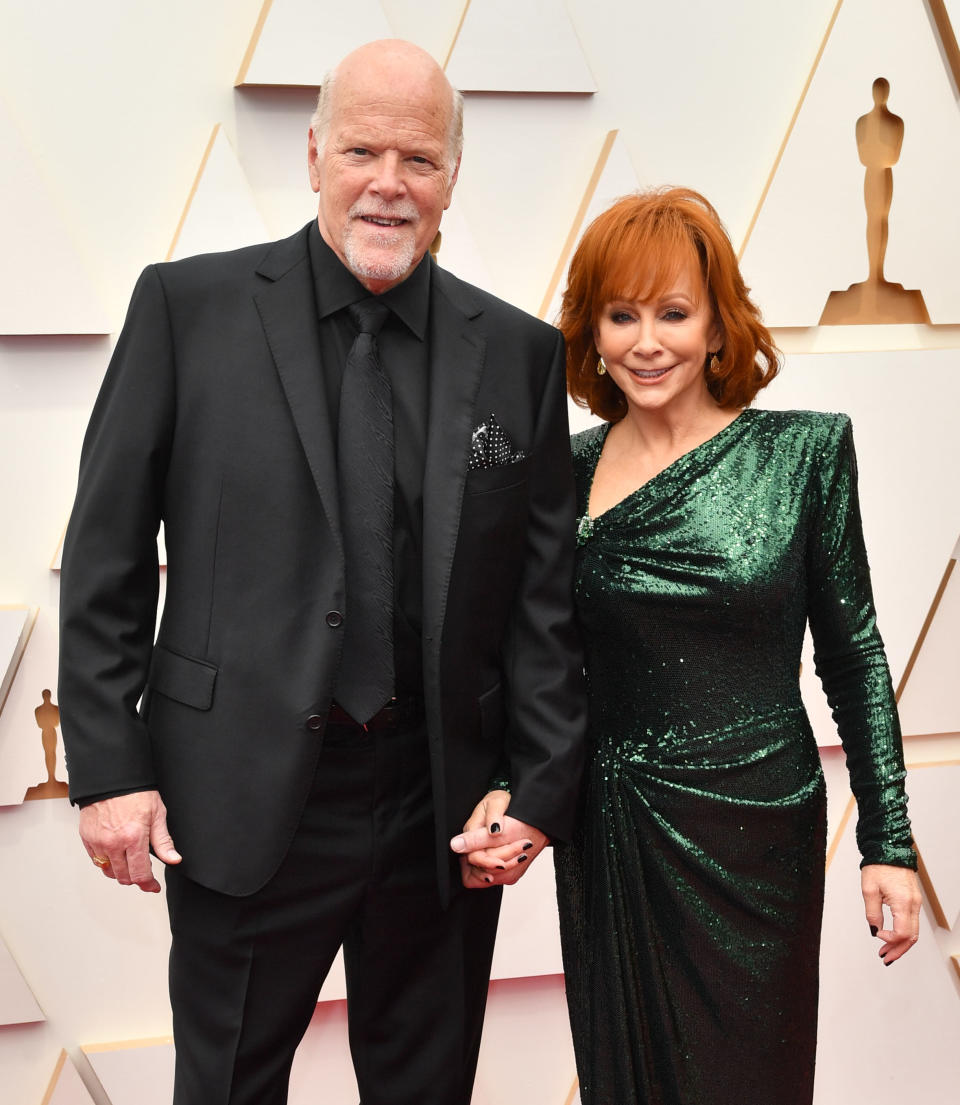 <span><span>Reba McEntire and Rex Linn 94th Annual Academy Awards, 2022</span><span>Stephen Lovekin/Shutterstock</span></span>