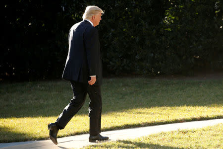 U.S. President Donald Trump returns to the White House after a visit to Homeland Security headquarters in Washington, U.S. January 25, 2017. REUTERS/Jonathan Ernst