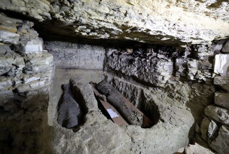 A number of mummies are seen inside the newly discovered burial site near Egypt's Saqqara necropolis, in Giza Egypt July 14, 2018. REUTERS/Mohamed Abd El Ghany