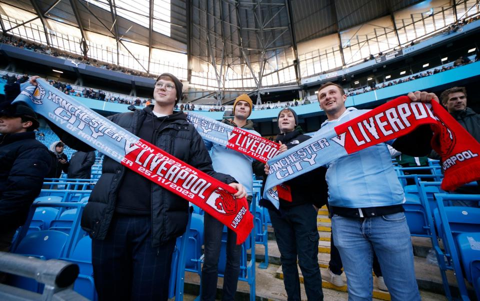 Manchester City fans at the Etihad before the game against Liverpool