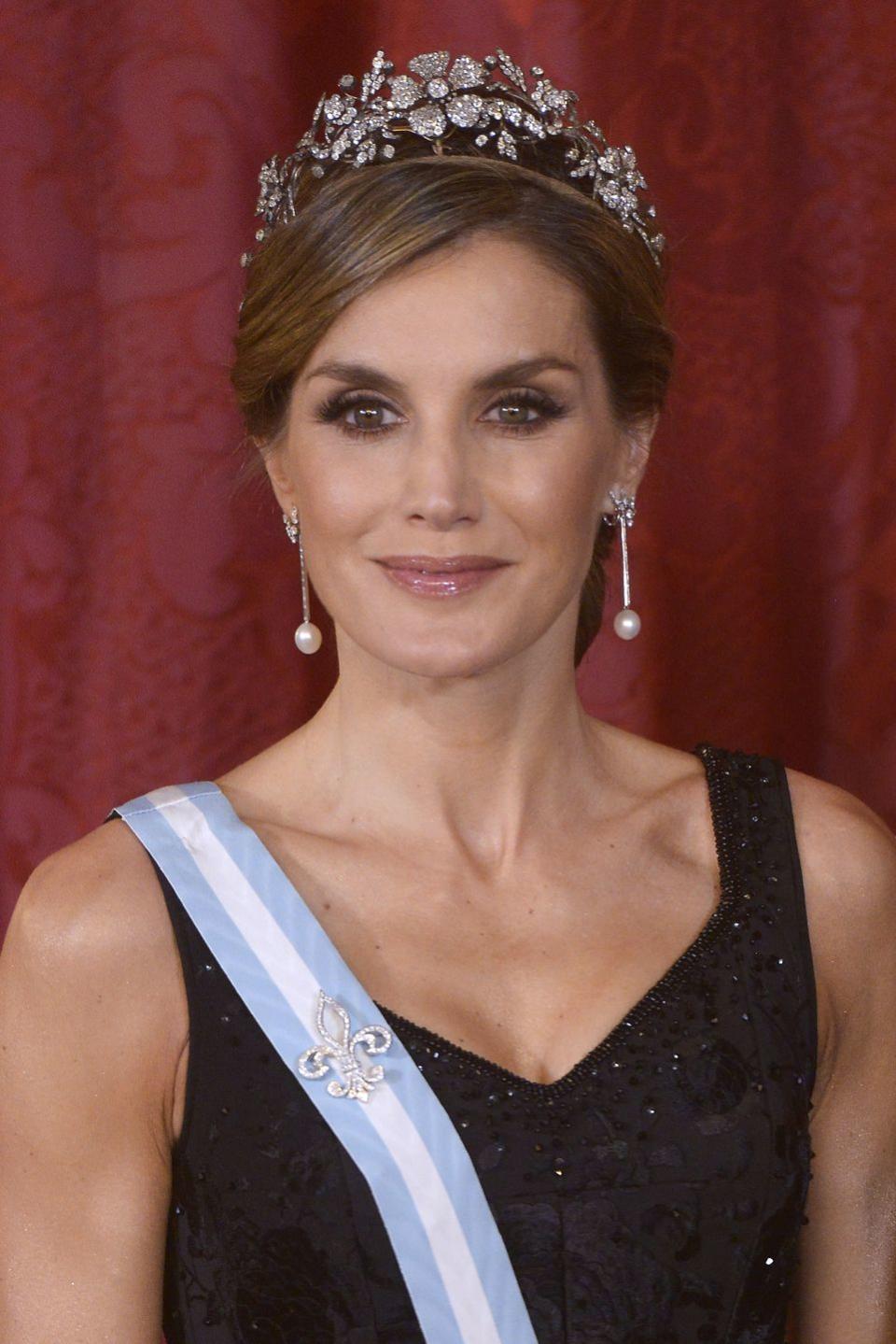 <p>A former journalist and news anchor, Letizia met her future husband on the Galician coast of Spain while she was covering the sinking of an oil ship. In 2004, the pair tied the knot after Felipe, the then-Prince of Asturias, proposed with a 16-baguette diamond ring. Letizia officially became the Queen of Spain 10 years later, after Felipe ascended the throne from his father. She is the first Spanish queen to have commoner roots, though she is also a descendent of medieval nobility.</p>