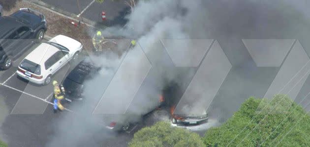 Choppercam: Aerial views of the fire engulfing four vehicles at an IGA supermarket. Photo: 7News