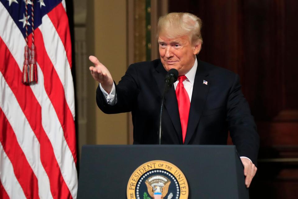 President Donald Trump is pictured speaking to the Interagency Task Force to Monitor and Combat Trafficking in Persons annual meeting at the White House