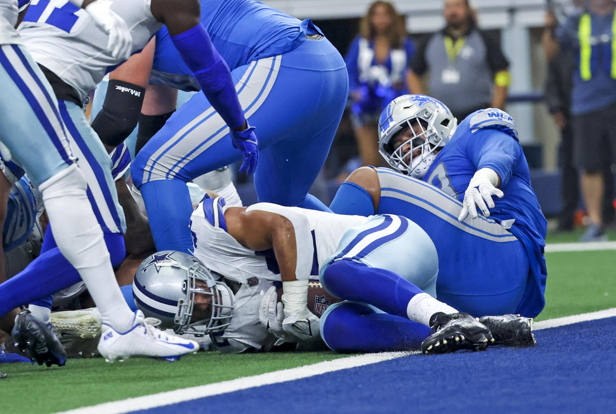 Oct 23, 2022; Arlington, Texas, USA;  Dallas Cowboys linebacker Anthony Barr (42) recovers a fumble during the second half against the Detroit Lions at AT&T Stadium. Mandatory Credit: Kevin Jairaj-USA TODAY Sports