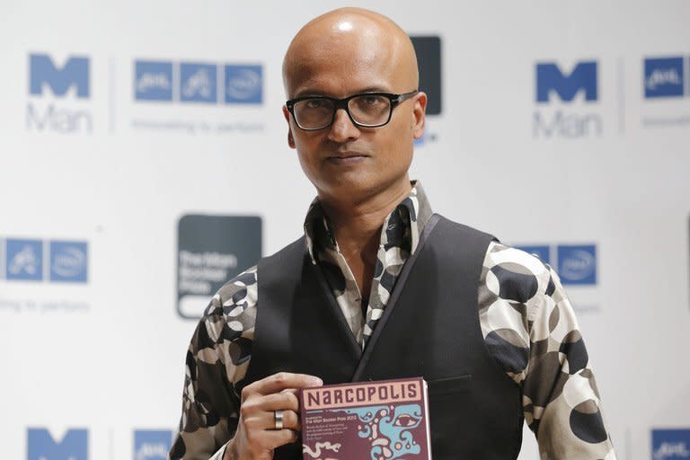 Indian author Jeet Thayil holding his book "Narcopolis" in London on October 15, 2012. A debut novel and a work by a Nobel laureate were among five books shortlisted for Asia's most prestigious literary prize on Wednesday, with entries across the region from Turkey to Japan