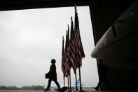 U.S. Democratic presidential candidate Hillary Clinton arrives to a press briefing before boarding her campaign plane at the Westchester County airport in White Plains, New York, U.S. September 19, 2016. REUTERS/Carlos Barria