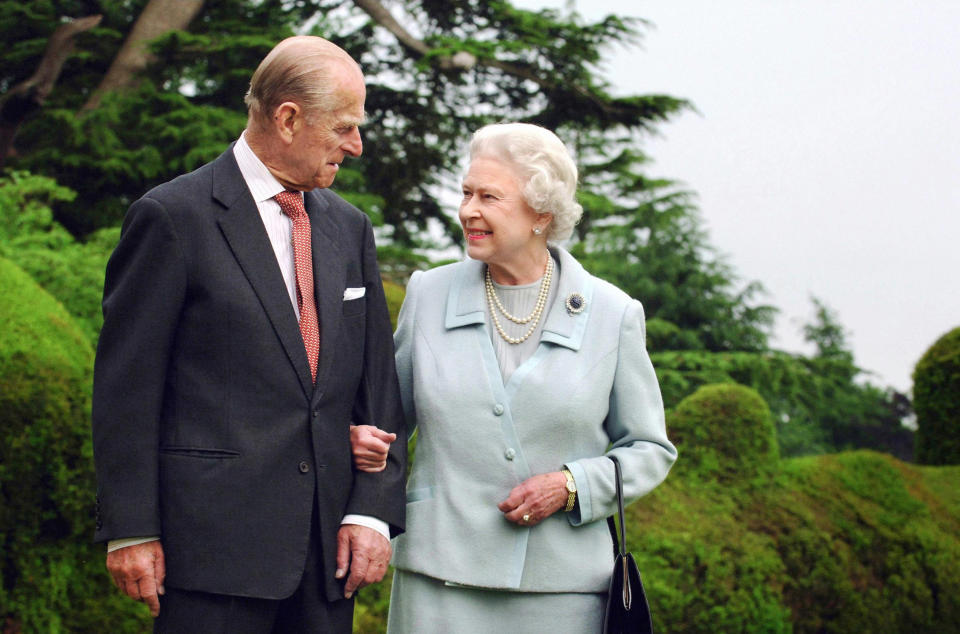 File photo taken in 2007 of Queen Elizabeth II and the Duke of Edinburgh at Broadlands, where the royal couple spent part of their honeymoon after their wedding in 1947. The Duke of Edinburgh celebrates his 99th birthday Wednesday.