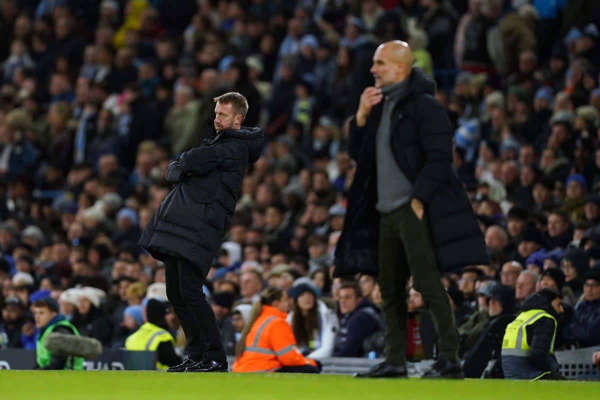 Pep Guardiola, right, said Graham Potter must be give more time at Chelsea (Martin Rickett/PA) (PA Wire)