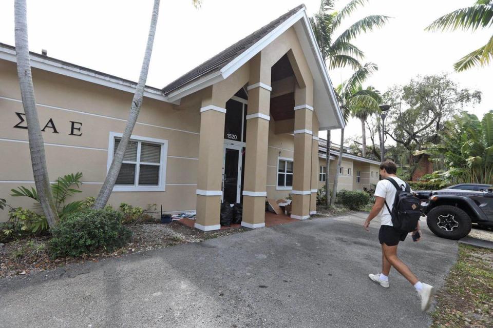 A person walks towards the Sigma Alpha Epsilon fraternity, 1520 Liguria Ave., near the University of Miami on Friday, March 1, 2024, in Coral Gables, Florida.