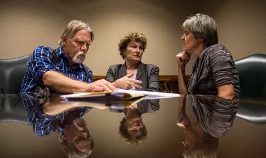Kathy and Robert Dyer, whose 18-year-old son, Graham, died while in police custody in 2013, speaks with Kelley Shannon (center), executive director of the Freedom of Information Foundation of Texas, in the Texas Capitol.