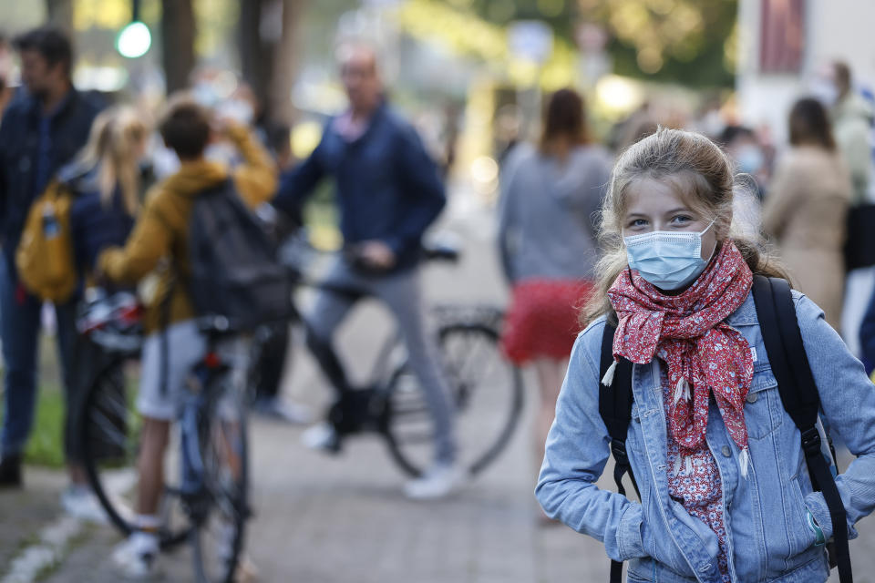 Children return to school in Strasbourg, eastern France, Thursday Sept. 2, 2021. France’s virus situation has slightly improved in recent weeks, with about 17,000 confirmed cases of infection each day on average, down from more than 23,000 around mid-August. But many fear a reverse of the trend now that children are back to school. (AP Photo/Jean-François Badias)