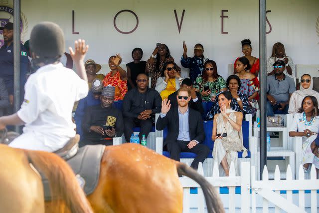 <p>Andrew Esiebo/Getty</p> Prince Harry, Duke of Sussex and Meghan, Duchess of Sussex visit Polo Club on May 12, 2024 in Lagos, Nigeria.